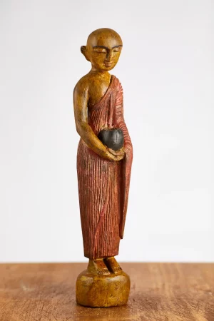 Image of Ajan statue in 'Pindapata' pose